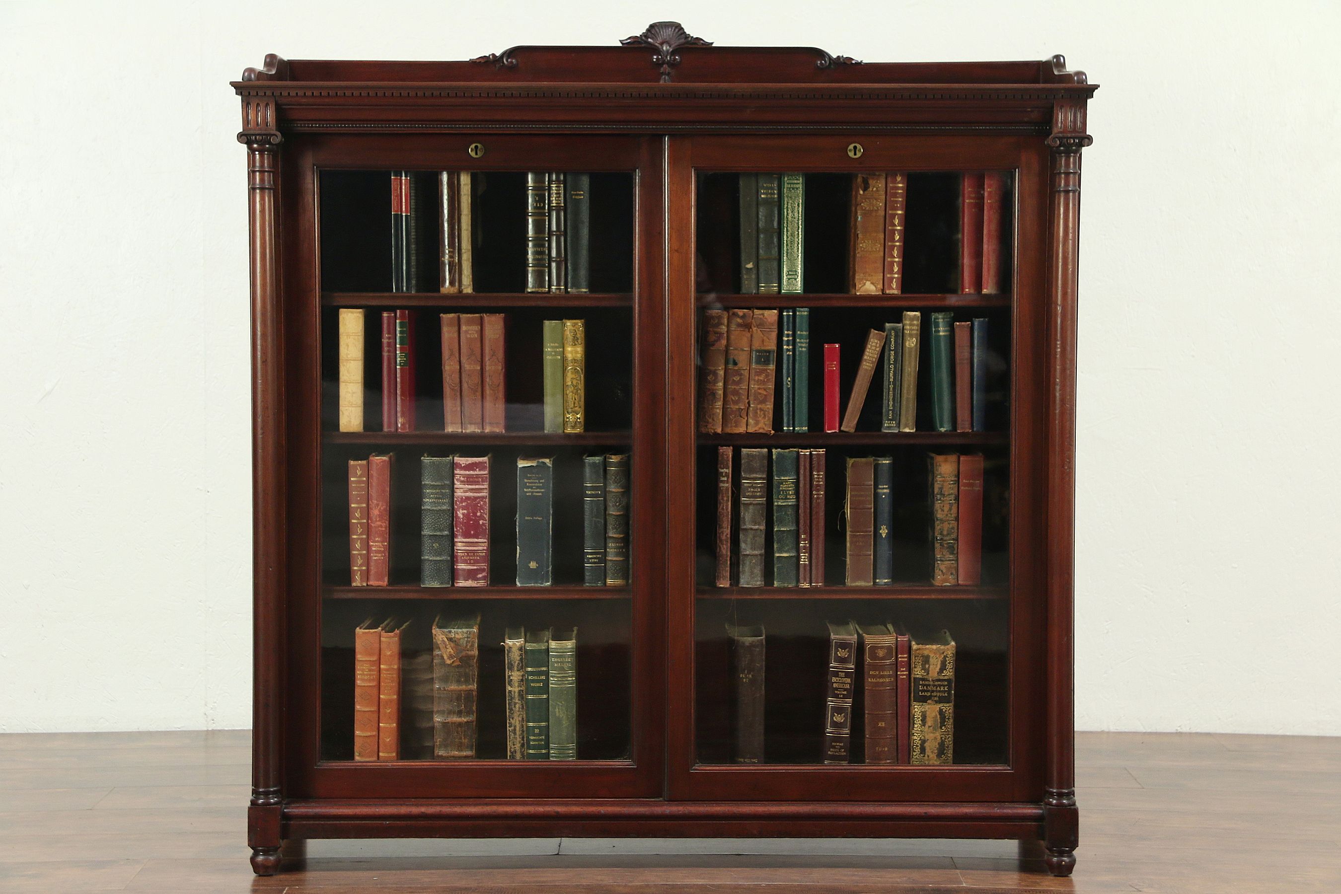Mahogany bookcase with glass doors